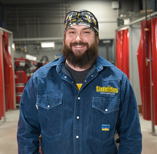 Steamfitters Apprentice standing in Weld Shop