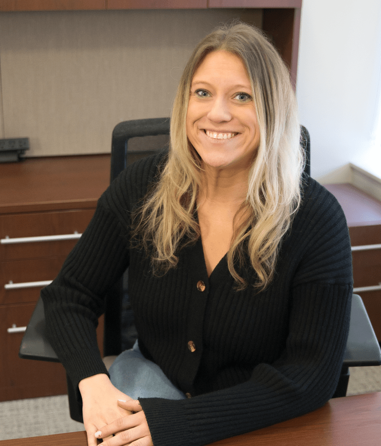 Kiersten Broadbent sitting in office at Local 449